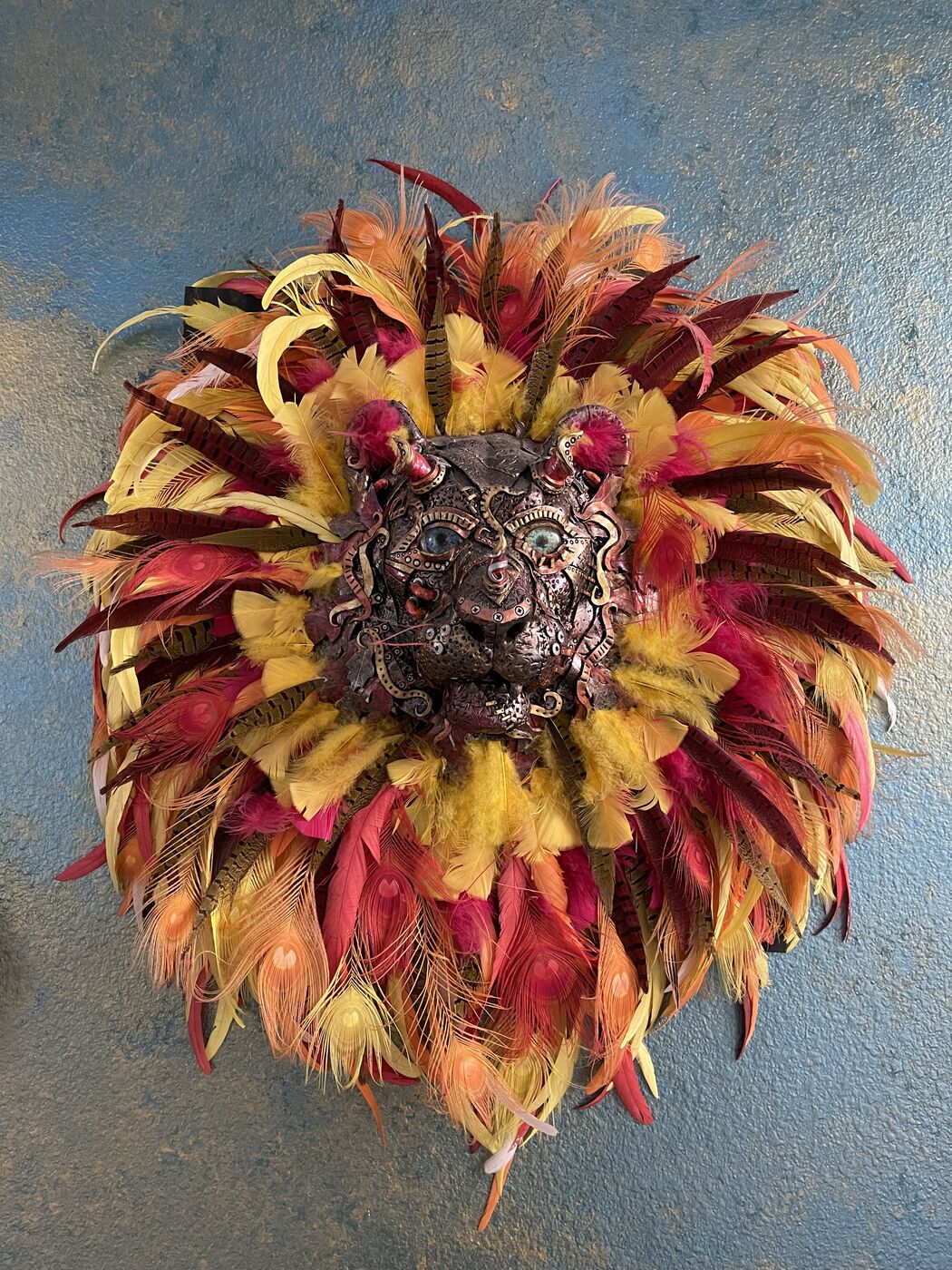 Sculpted steampunk animal-head wall mask by XZanthia — gears, metallic patina and a feather mane (piece 22 of 24)