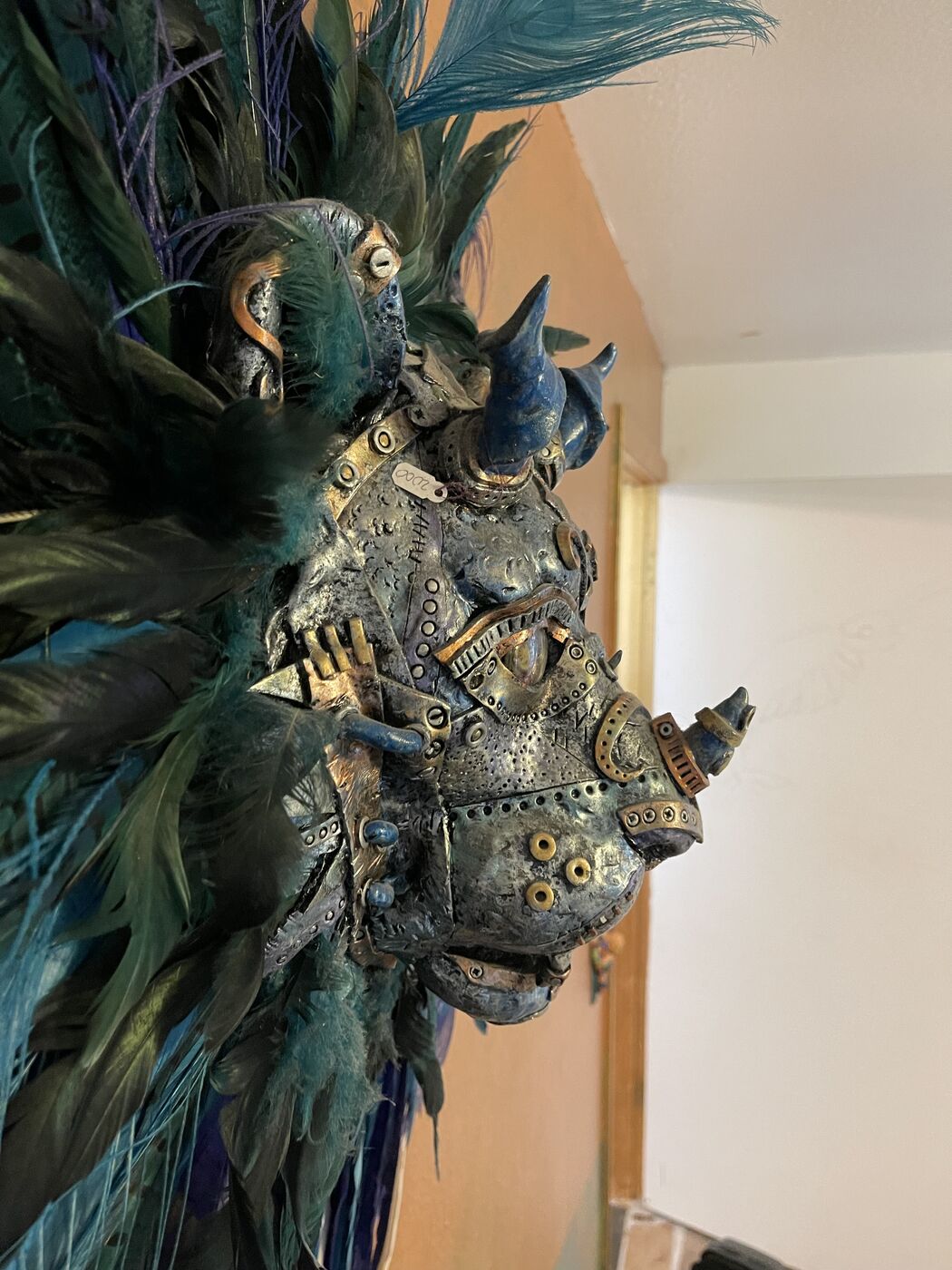 Sculpted steampunk animal-head wall mask by XZanthia — gears, metallic patina and a feather mane (piece 24 of 24)