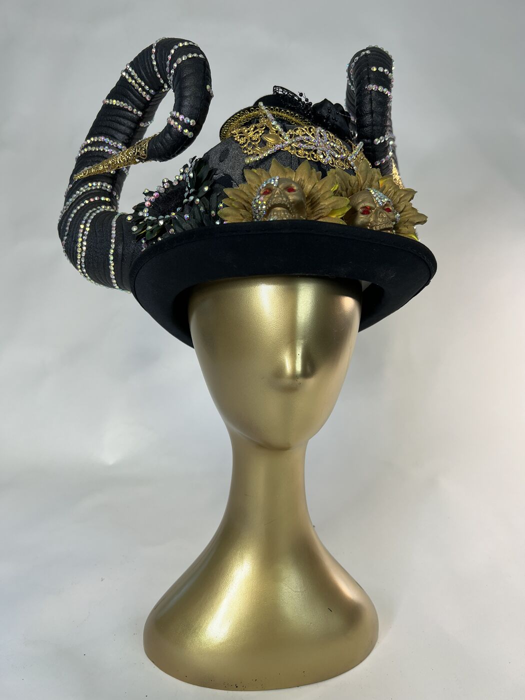 Handmade embellished top hat headpiece by XZanthia with horns and spikes, on a gold mannequin head (piece 4 of 15)