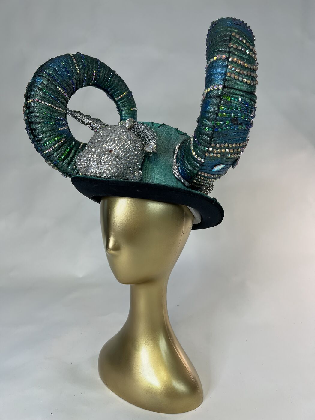 Handmade embellished top hat headpiece by XZanthia with horns and spikes, on a gold mannequin head (piece 5 of 15)