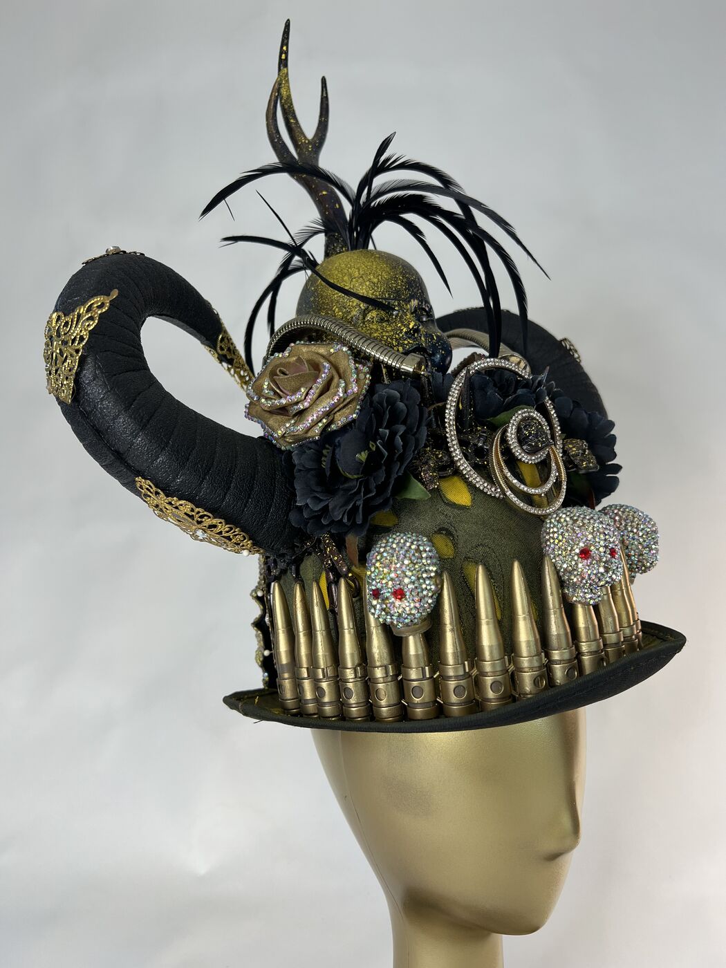 Handmade embellished top hat headpiece by XZanthia with horns and spikes, on a gold mannequin head (piece 6 of 15)