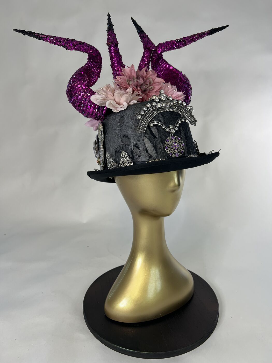 Handmade embellished top hat headpiece by XZanthia with horns and spikes, on a gold mannequin head (piece 7 of 15)