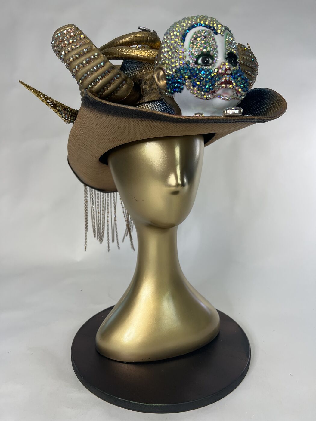 Handmade embellished top hat headpiece by XZanthia with horns and spikes, on a gold mannequin head (piece 8 of 15)